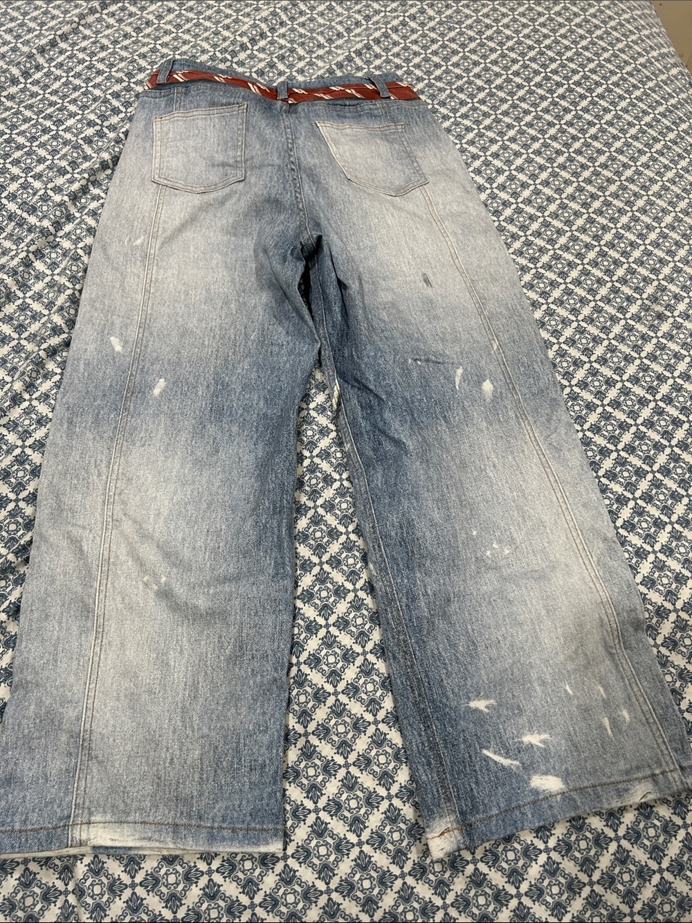 Relaxed Wide-Leg Distressed Blue Jeans with Red Tie Accent - Picture 3 of 3